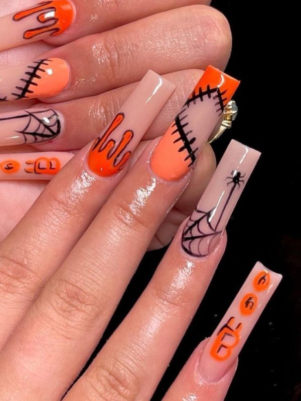 50 Pretty Spooky Halloween Nails Designs To Recreate Now Extraterrestrial Halloween Coffin Nails